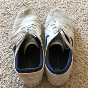 Men White and blue Nike shoes